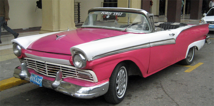 1957 pink & white Ford convertible