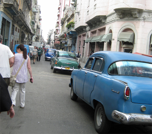 3 cars in row - foreground may be Plymouth