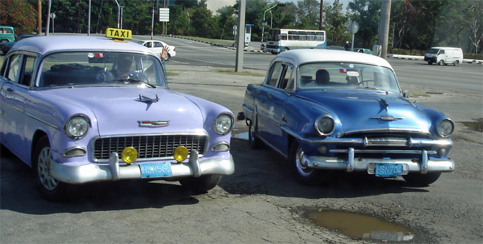 purple Chevy and blue Plymouth