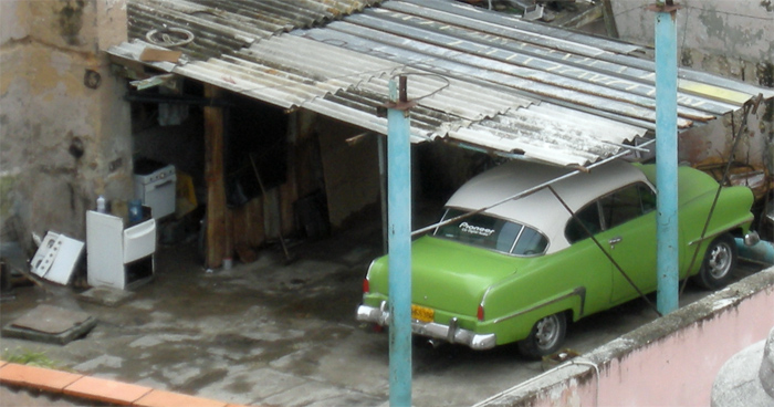 taken from rooftop, green car - Plymouth?