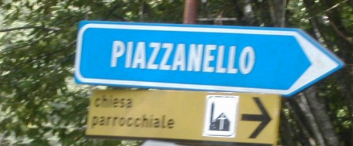 Sign to the parish church at Piazzanello