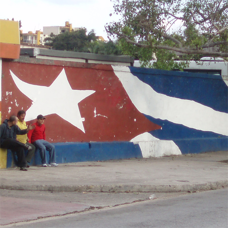Mural outside Saborit with flag