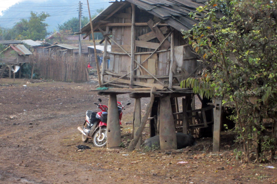 House on stilts with motorbike